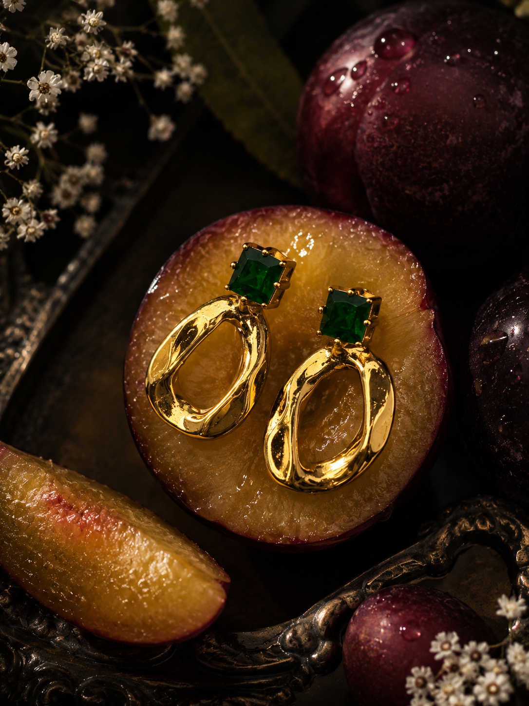 Emerald oval studs