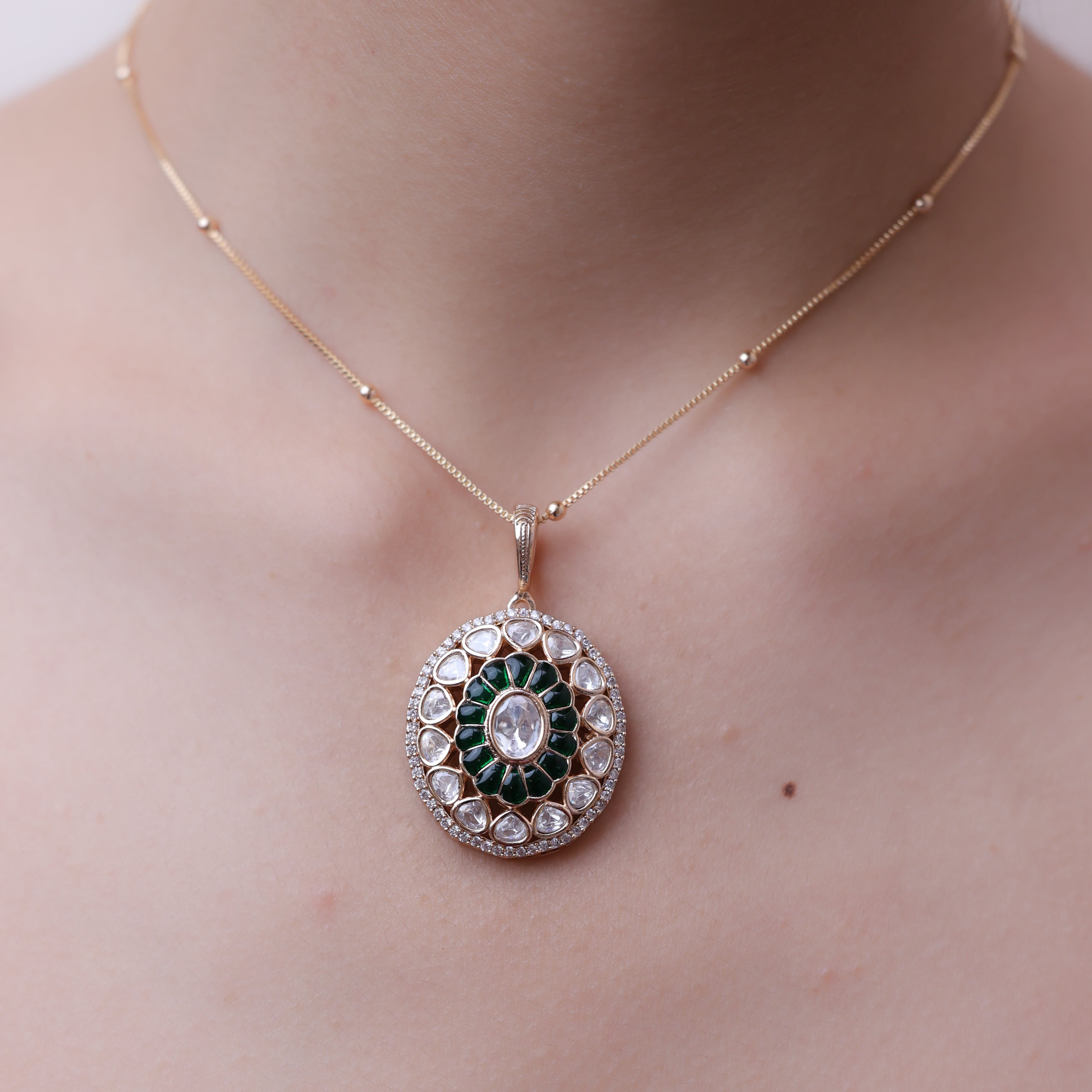 ANOKHI Emerald Kundan Rich pendant earrings set